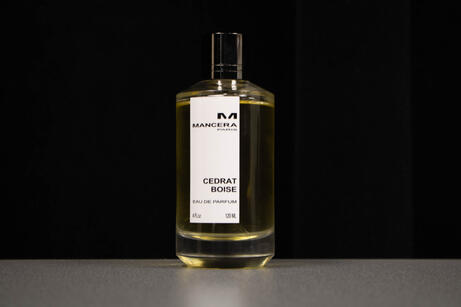 A photograph of a bottle of perfume. October 2025.