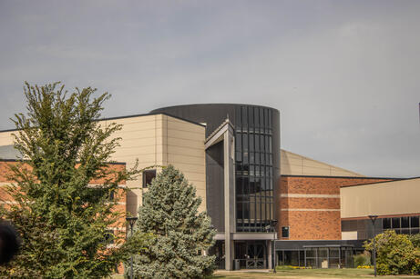 A photograph of the outside of a building. September 2025.